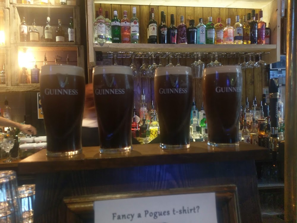 Pints of Guinness Lined up in a Liverpool pub for St Patricks Day