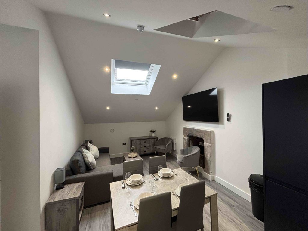 Cumberland Street serviced apartments modern living area with dining table